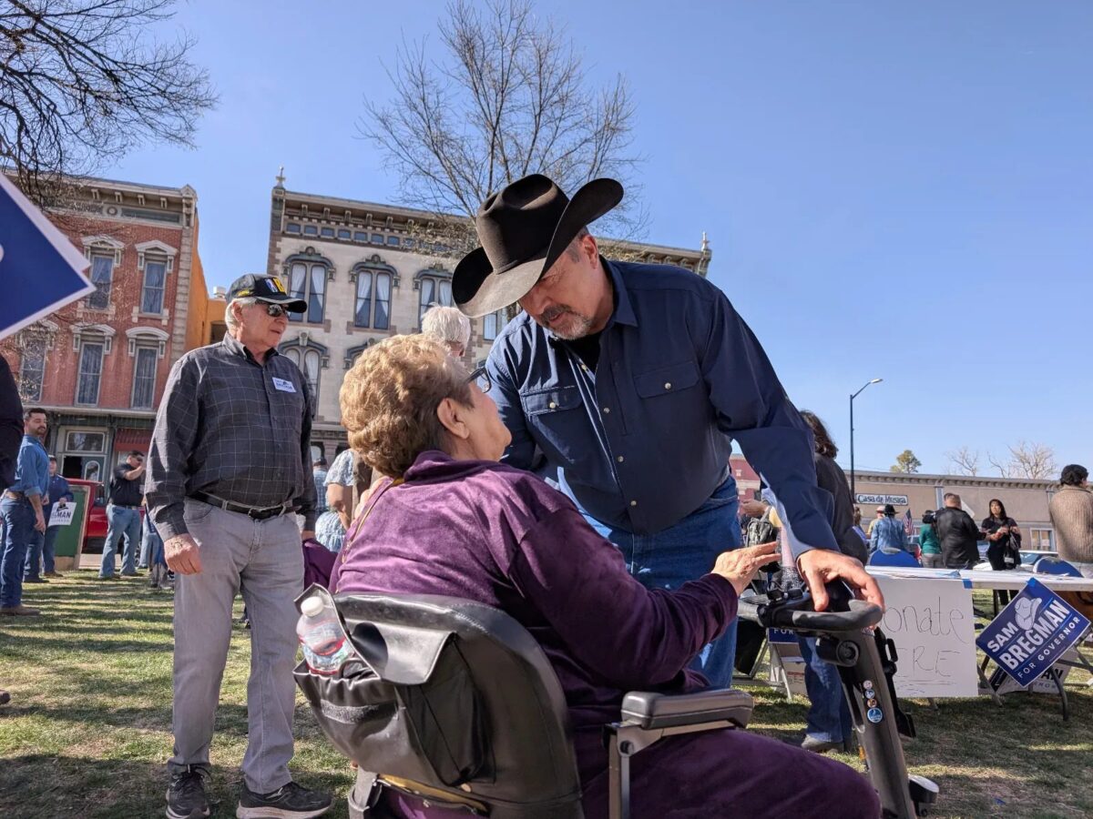 Sam Bregman at his Las Vegas gubernatorial campaign announcement, speaking to Juliette Gallegos.