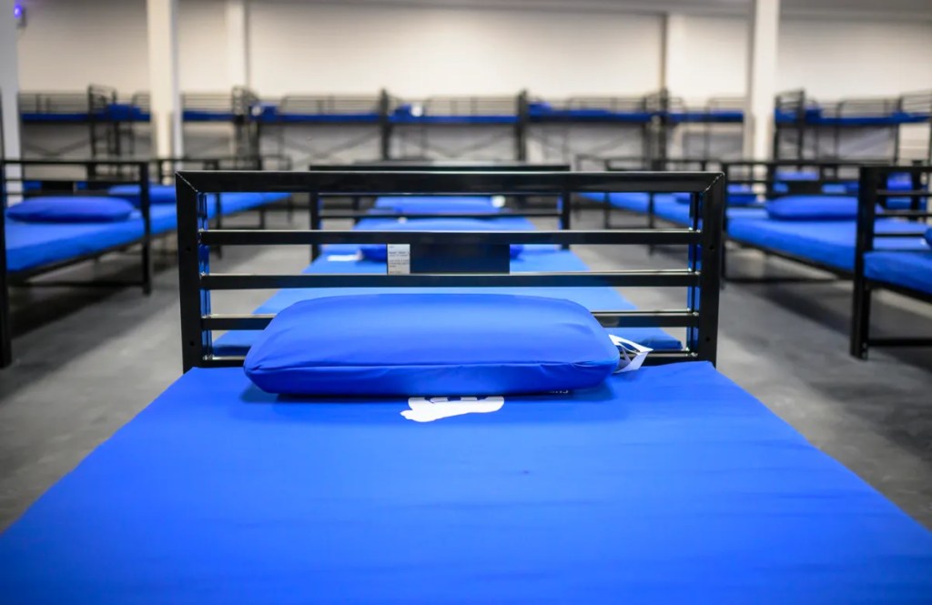 Shelter beds are seen inside Gateway West in Albuquerque. The city allocated $2 million in opioid settlement funds to launch a treatment navigation and assessment program through the Gateway system. Photo by Roberto E. Rosales/City Desk ABQ.