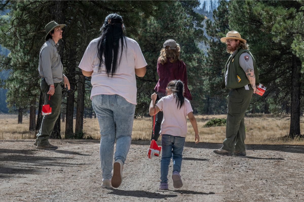 Park rangers lead a guided hike at the 2024 Valles Caldera Fall Fiesta. (NPS)