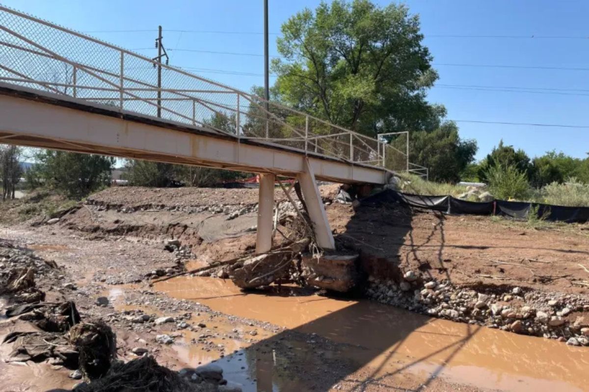 The county will spend $1.29 million to construct a new bridge connecting the Los Vecinos Community Center to A. Montoya Elementary and Roosevelt Middle schools. The structure, used daily by students accessing programs at Los Vecinos Community Center, was damaged beyond repair during flooding in July.