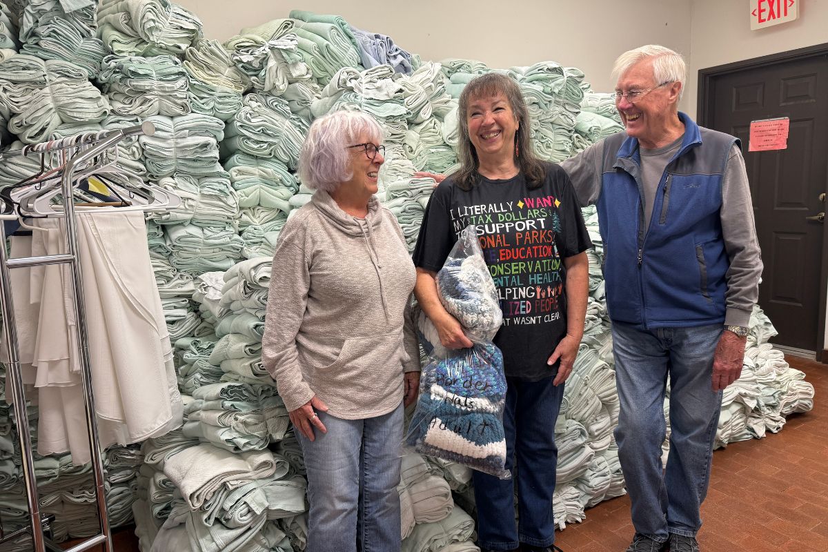 Jack and Cheryl Ferrell, shown with a volunteer from Albuquerque, collected donated blankets for a migrant shelter in Juarez. (Courtesy photo)