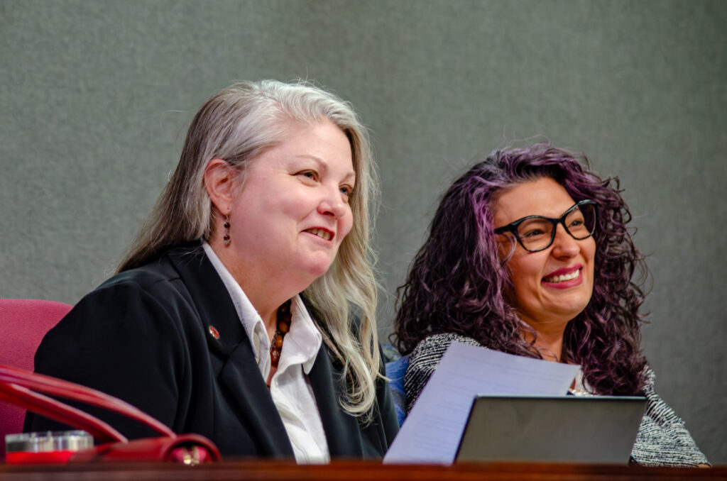 Councilor Tammy Fiebelkorn, left, sponsor of the proposed ordinance that would expand citywide recycling access, sits beside Stephanie Telles, right, during an Albuquerque City Council meeting.(Jesse Jones)