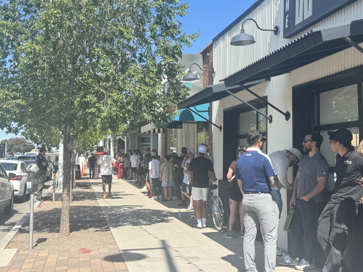 People standing in line outside of Kingswell Slkate Shop for the "Hatch Chile" shoe (Photo by Sara Atencio-Gonzales)