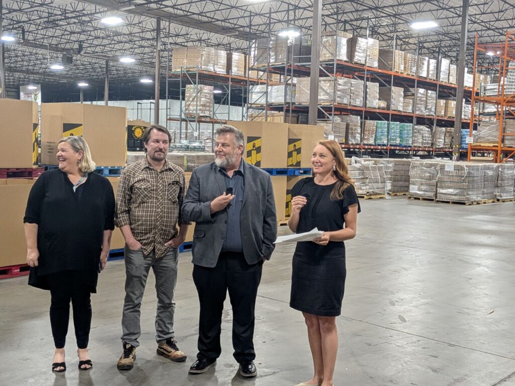 U.S. Rep. Melanie Stansbury, right, toured Roadrunner Food Bank on Aug. 10, warning that federal cuts have stripped food assistance from more than 21,000 New Mexicans, about half of them children, since October. (Kevin Hendricks)