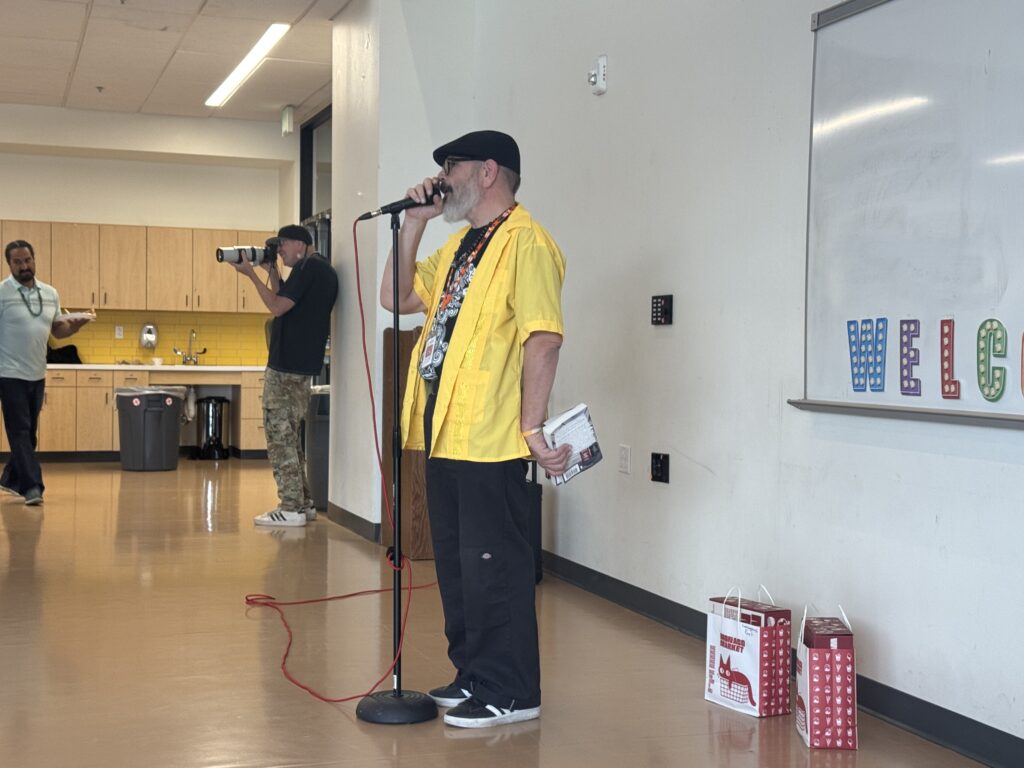 Manuel Gonzalez at the NACA Literacy Night (Photo by Sara Atencio-Gonzales)