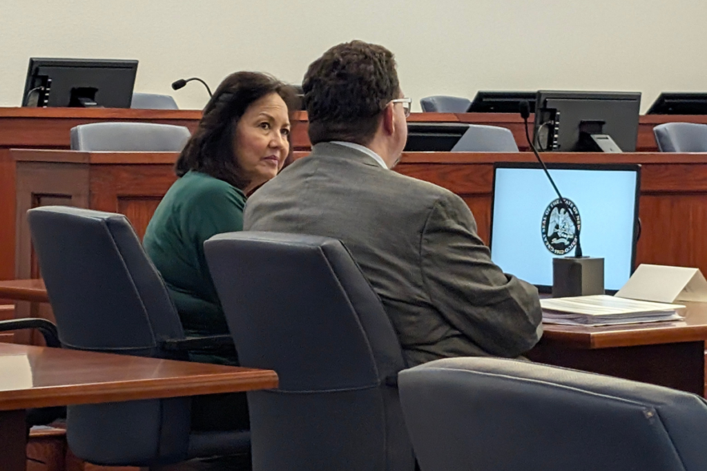 Sandoval County Clerk Anne Brady-Romero and Sandoval County Attorney Michael Eshleman listen to arguments during a Sept. 2, 2026, show-cause hearing in the Thirteenth Judicial District Court in Bernalillo, where Judge James A. Noel ruled Brady-Romero is not required to place Democratic nominee Matthew Wayne Herman on the November ballot for House District 23. (Kevin Hendricks)